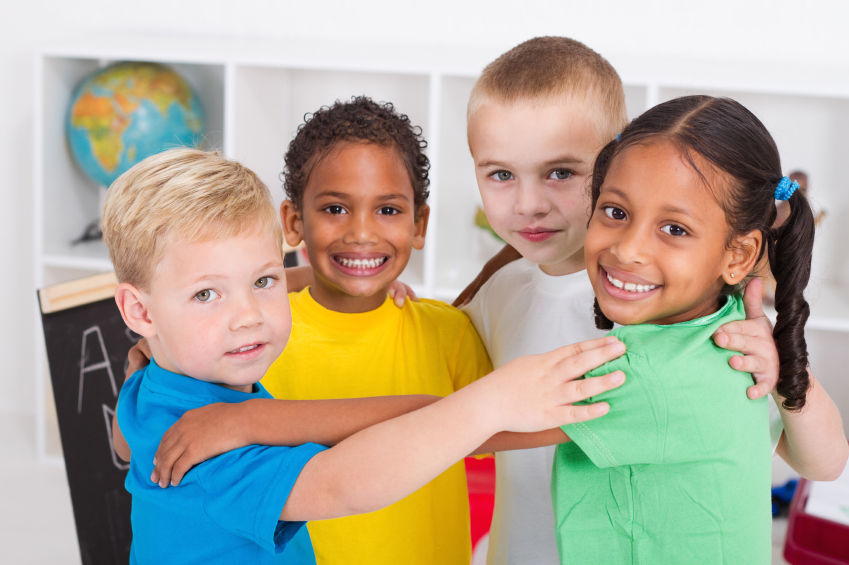 four children hugging