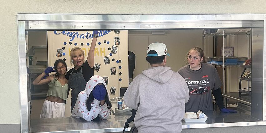 students working at the lunch snack shack