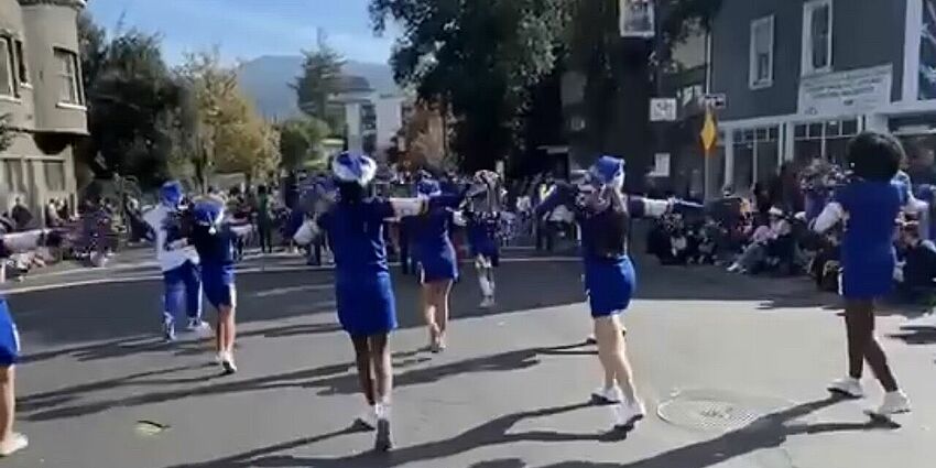 Monroe Cheerleaders doing dance routine in Los Gatos Parade