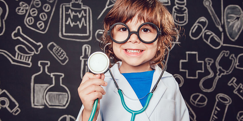small child with a stethoscope and a  