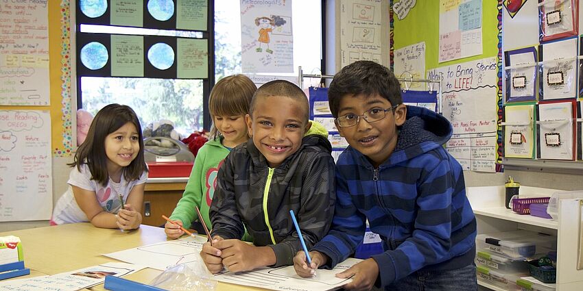 happy elementary school boys and girls