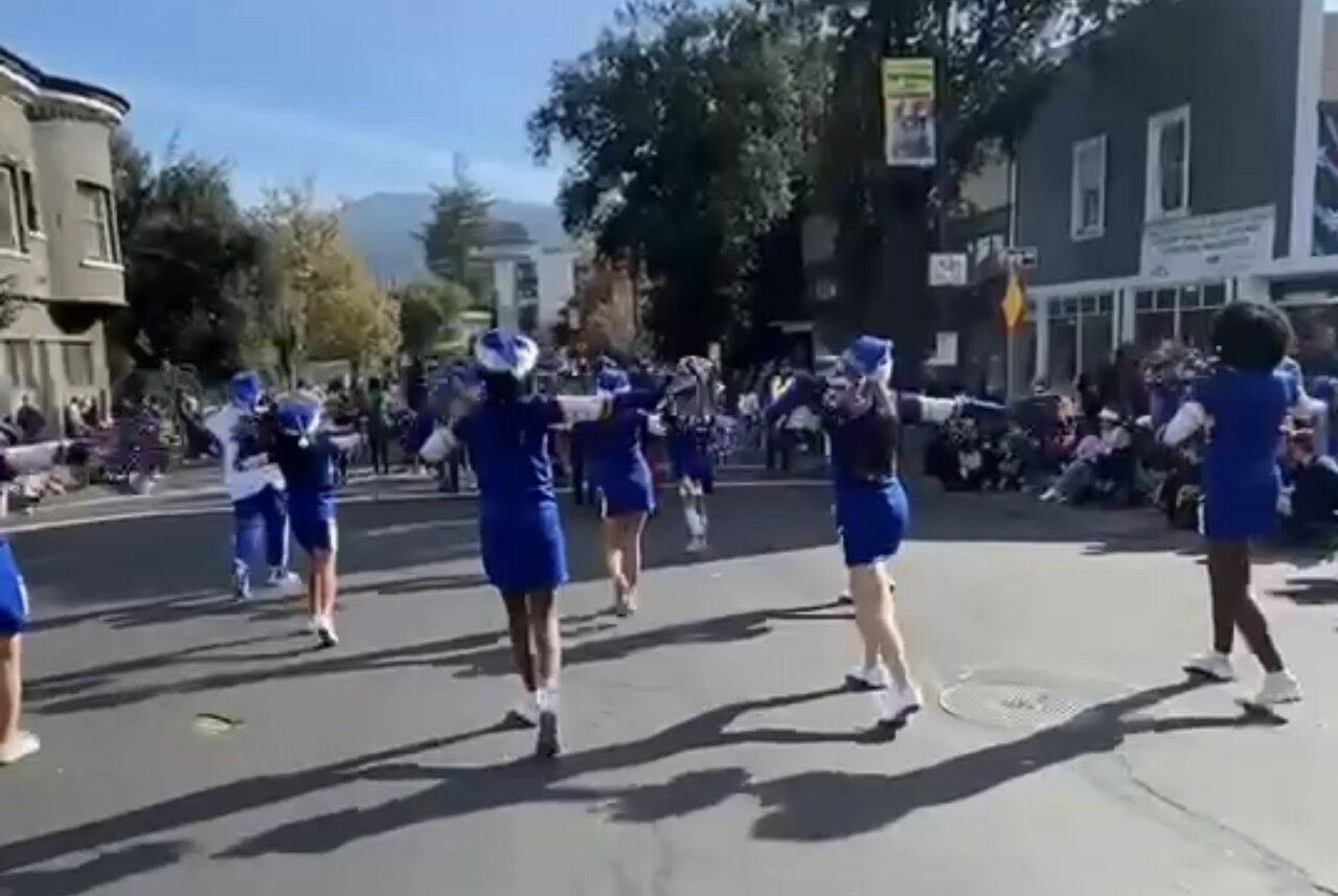 Monroe Cheerleaders doing dance routine in Los Gatos Parade