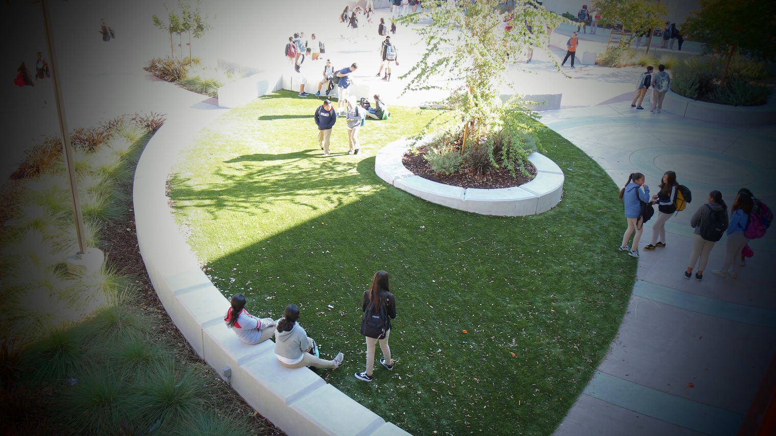 view from 2nd story of students on campus